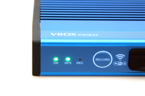 Photograph showing the OK and GPS LEDs as illuminated as green on a VBOX Video HD2. 