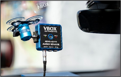 Photograph of the ADAS Audio Sensor mounted to a windscreen.