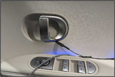Photograph of the Door Handle Force Sensor sensing resistor in use.
