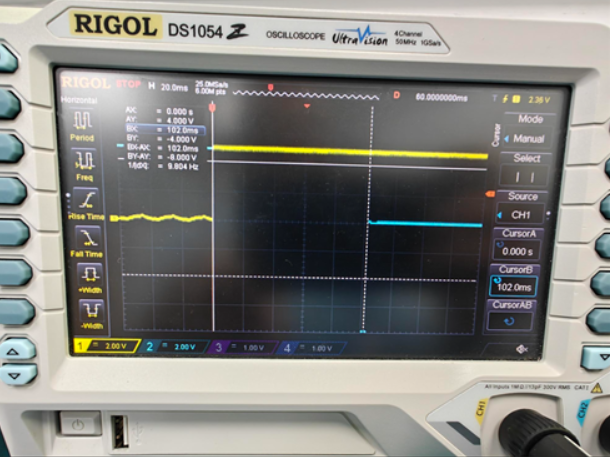 Photograph of an oscillosope showing a 100 ms fixed delay on a signal.