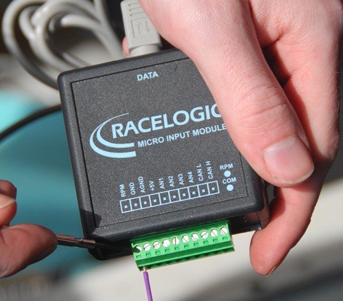 Photograph of connecting the RPM signal wire to the Micro Input Module