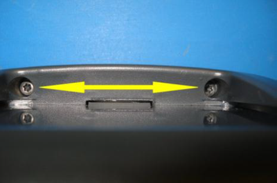 Screw location for fasteners that secure the front panel to the rear casing, location 1.