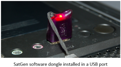 Photograph of a SatGen dongle in a PC.