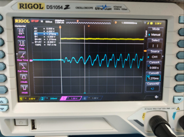 Photograph of an oscilloscope showing the signal with an offset.