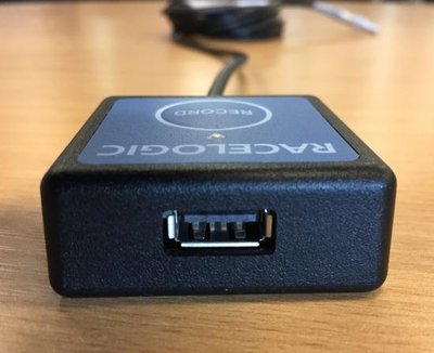 Photograph of the side view of the Wired Logging Switch showing a USB port.